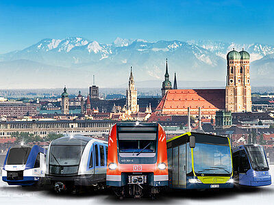MVV-Verkehrsmittel im Vordergrund der Stadt München
